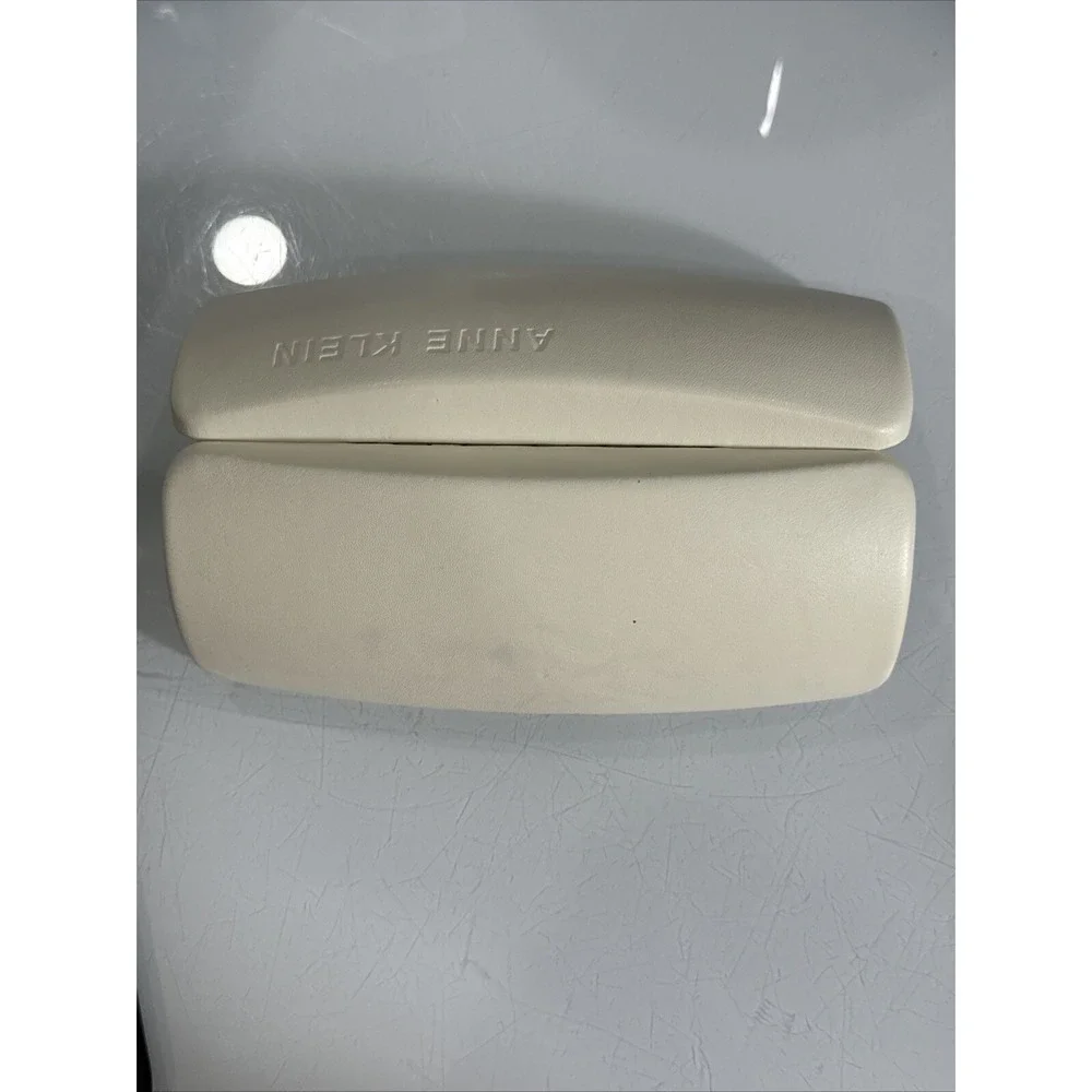 Anne Klein off white hard eyeglass clamshell case with logo